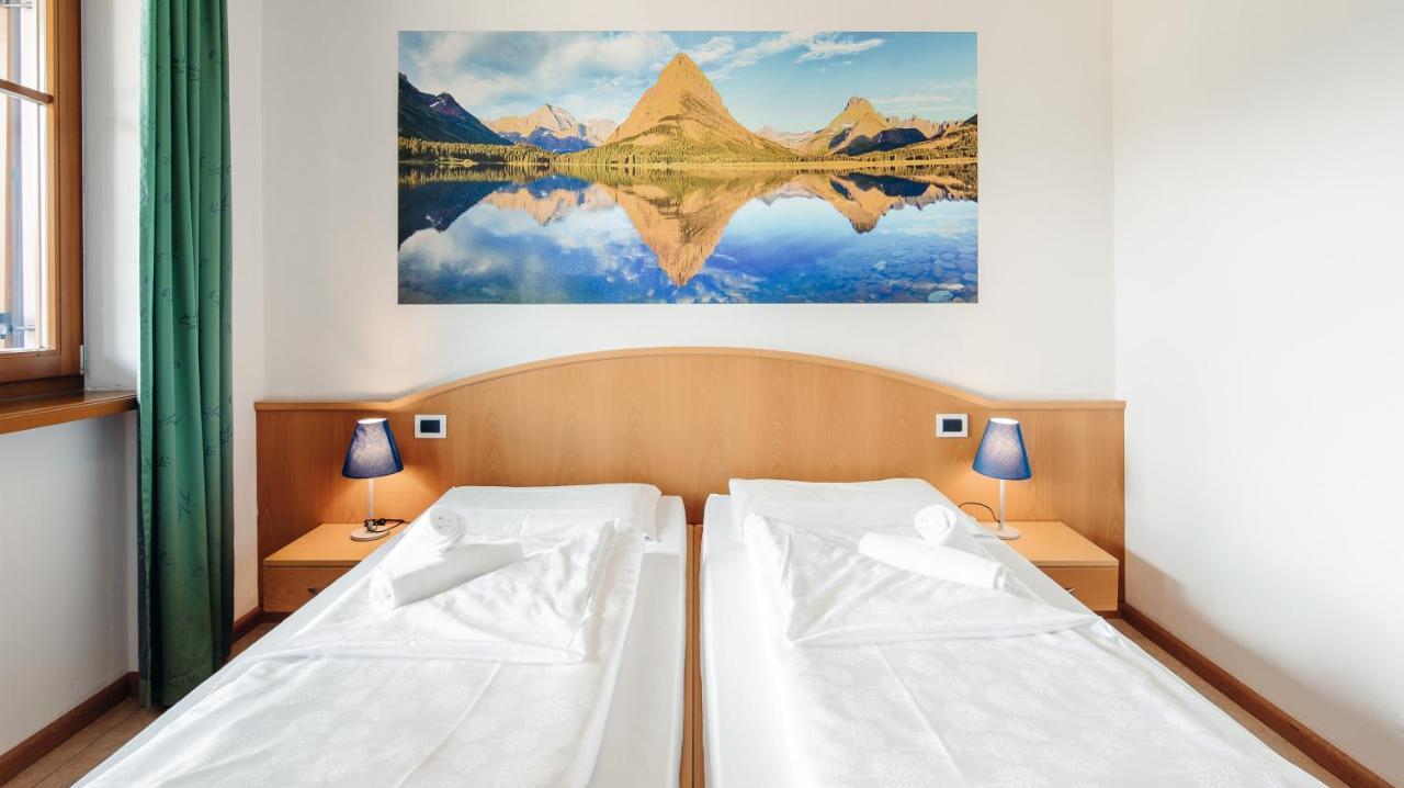 Hotel Corno Bianco Nova Ponente Szoba fotó